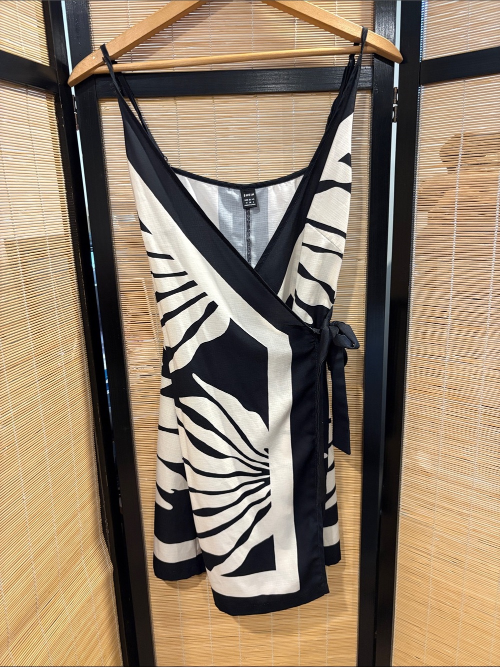 Sleeveless Black & White Wrap Dress with Abstract Print